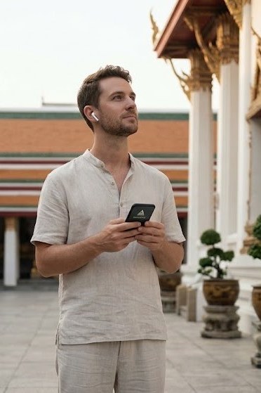 Lone visitor in the courtyard of a Rattanakosin temple — self-guided visit, at your own pace