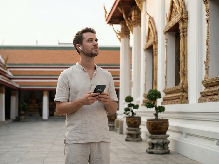 Visitor exploring a temple compound alone — no guide, no fixed schedule