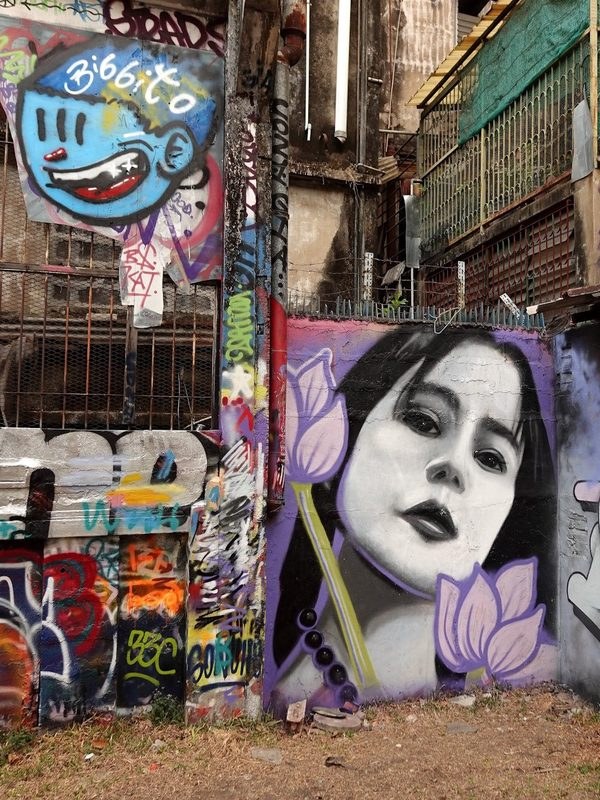 Street art mural in Talat Noi — Bangkok Creative District, audio-guided route